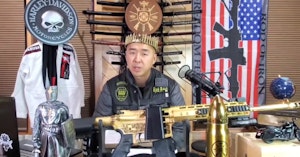 Pastor Hyung Jin “Sean” Moon of the Sanctuary Church giving a video sermon surrounded by gun merch