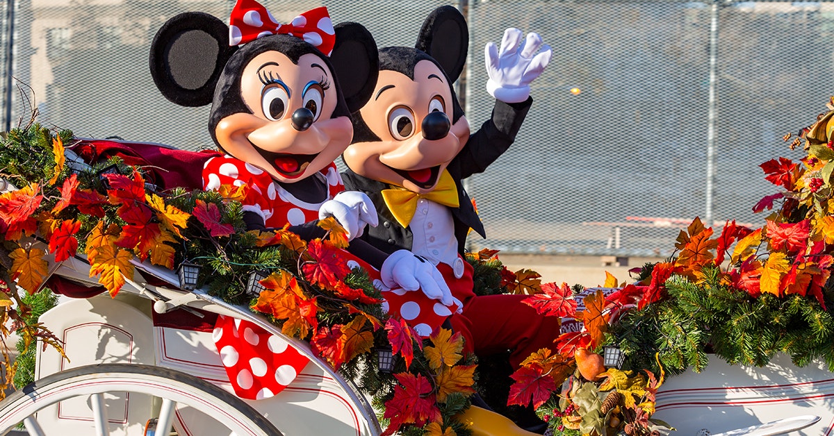 Disney adult' couple spark backlash after paying for Mickey Mouse  appearance over wedding food