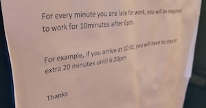 Paper sign saying workers are required to stay 10 minutes past their scheduled shift for every minute they're late
